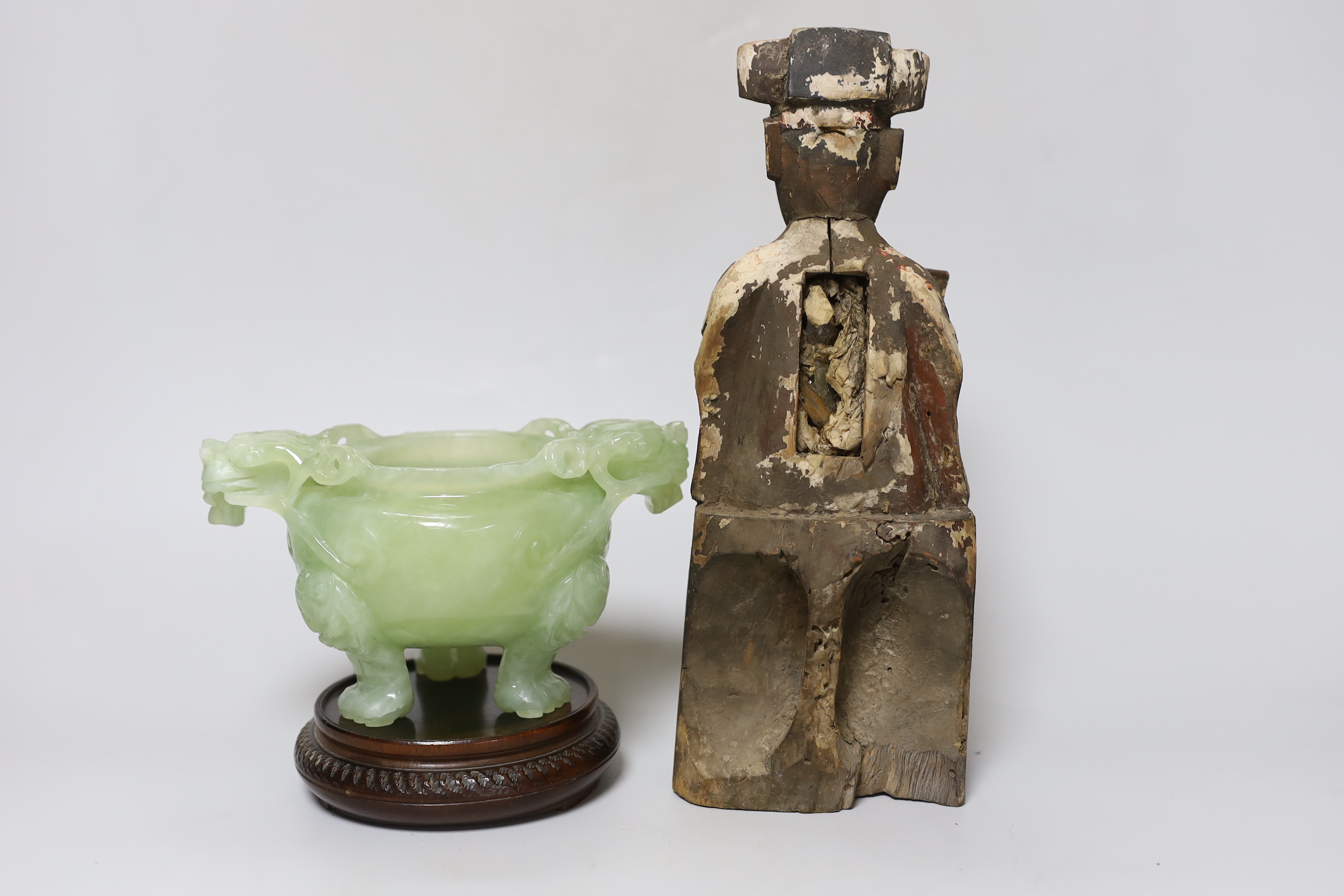 A Chinese bowenite jade censer, on stand and Chinese Qing carved and lacquered wood figure of a seated deity, 24cm